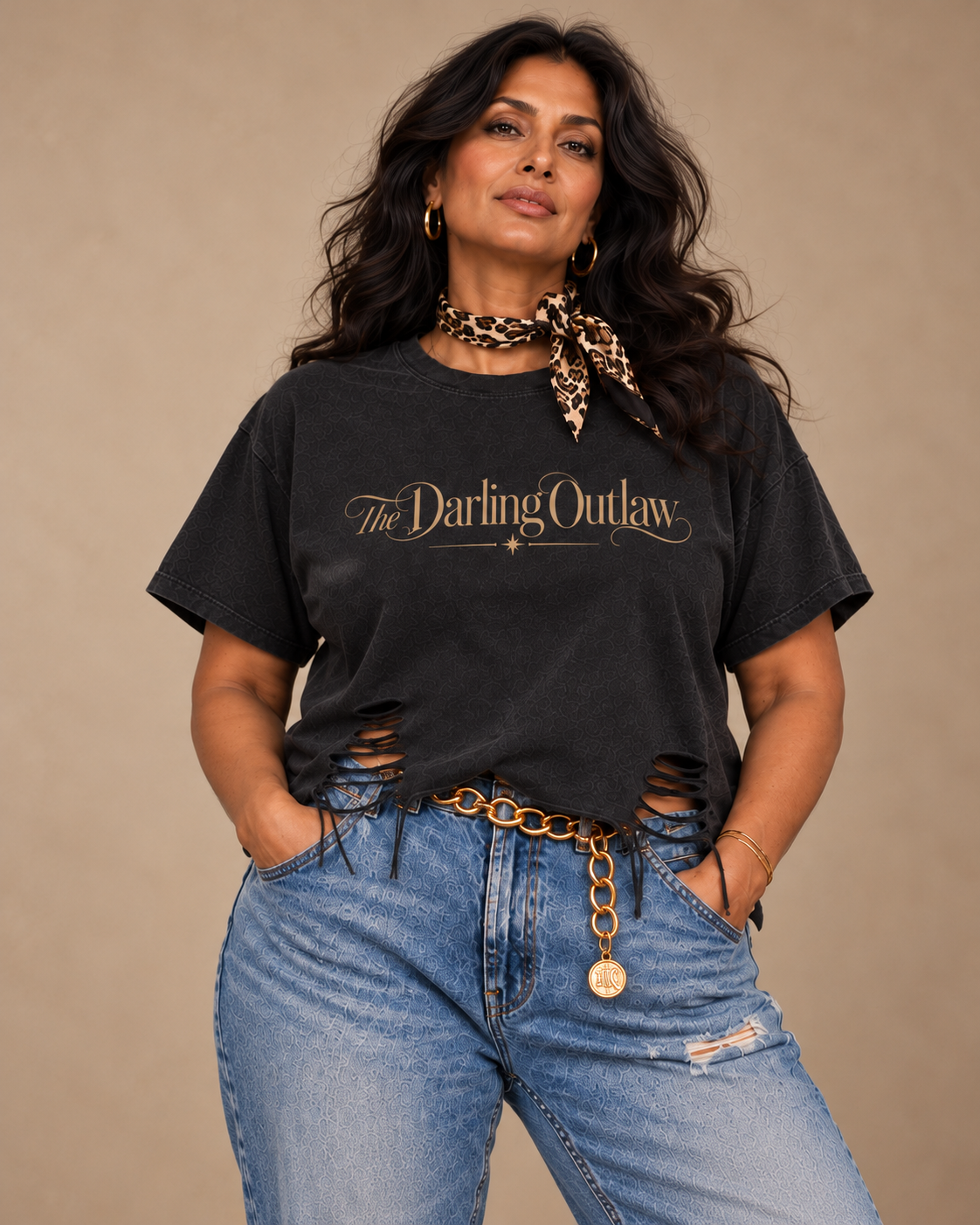 Gold lettering graphic on black Darling Outlaw distressed tee